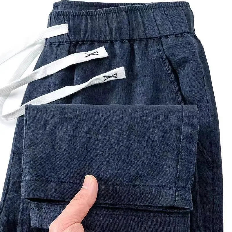 Pure linen Chinese style elastic waist trousers in straight leg cut with drawstring closure