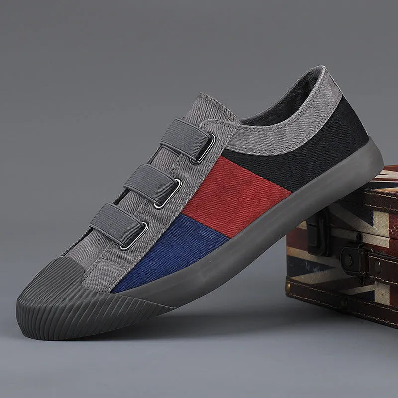Men's canvas casual sneakers with elastic band fastening and vulcanised rubber sole in multiple colour options