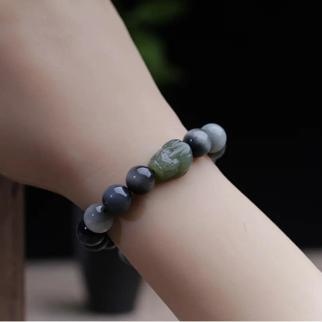 Black bracelet with 10mm Eagle Eye Stone beads and genuine Hetian jade Pixiu pendant