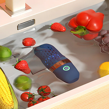Blue capsule fruit and vegetable cleaner with charger, shows 3000mAh battery capacity