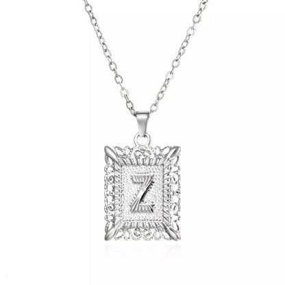 Personalized initial letter necklace in gold or steel, featuring any letter from A to Z