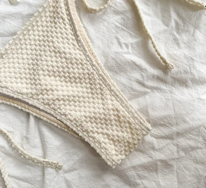 Women's halter lace-up bikini set with adjustable back ties in milky white colour