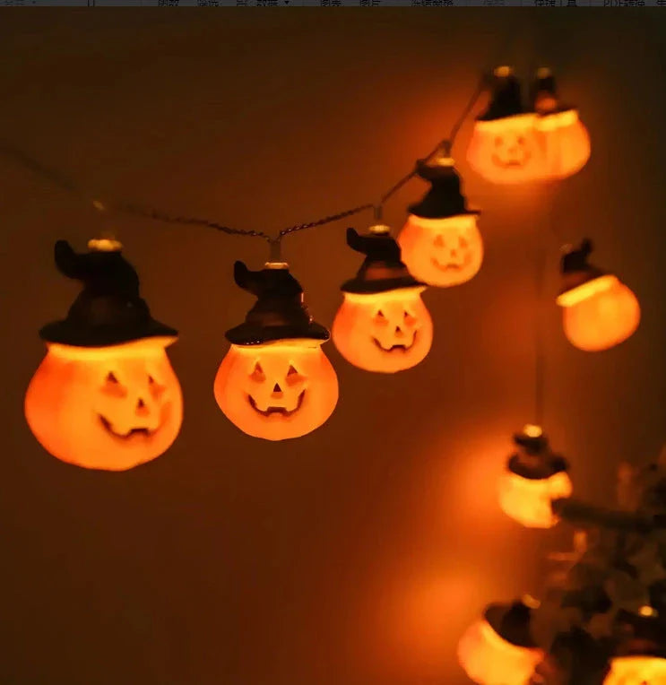Warm glowing Halloween lighting chain with pumpkins, ghosts, and bats for indoor and outdoor decoration