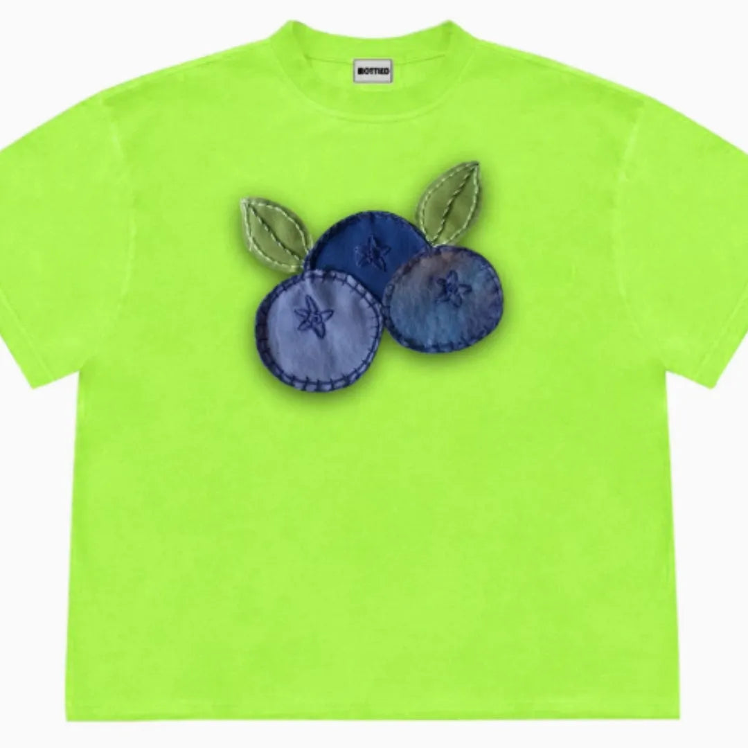 Blueberry and plant patchwork pattern on a loose-fit short sleeve Ice Oxygen Cotton T-shirt.