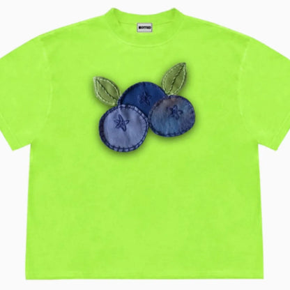 Blueberry and plant patchwork pattern on a loose-fit short sleeve Ice Oxygen Cotton T-shirt.