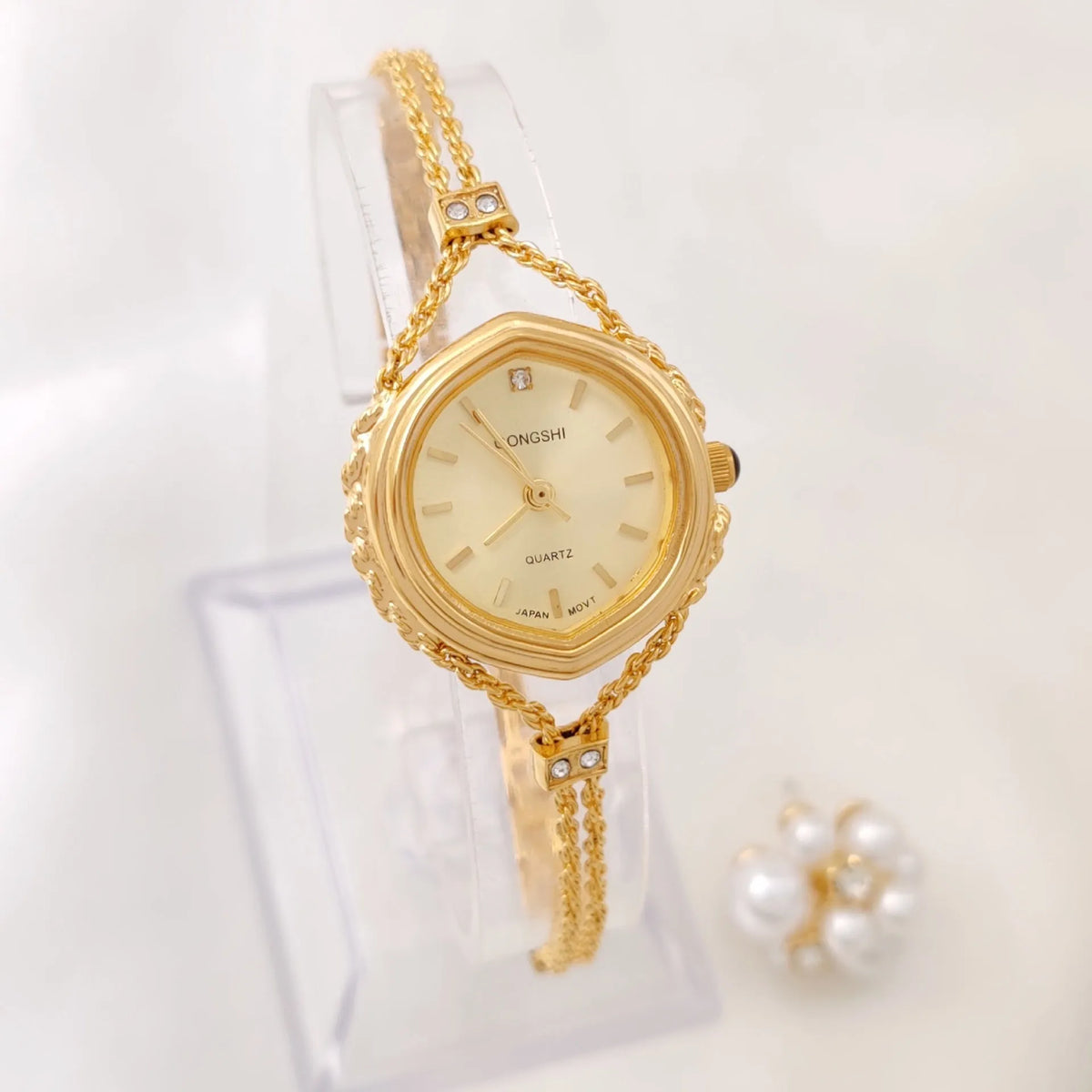 Women's gold and silver mori style quartz watch with 25mm dial and chain strap