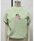 Kids' comfortable short sleeve shirts in green and pink, perfect for any occasion.
