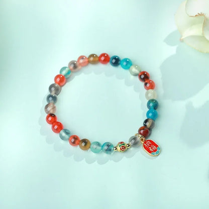 Women's natural agate bracelet with copper coin snake elements in geometric design