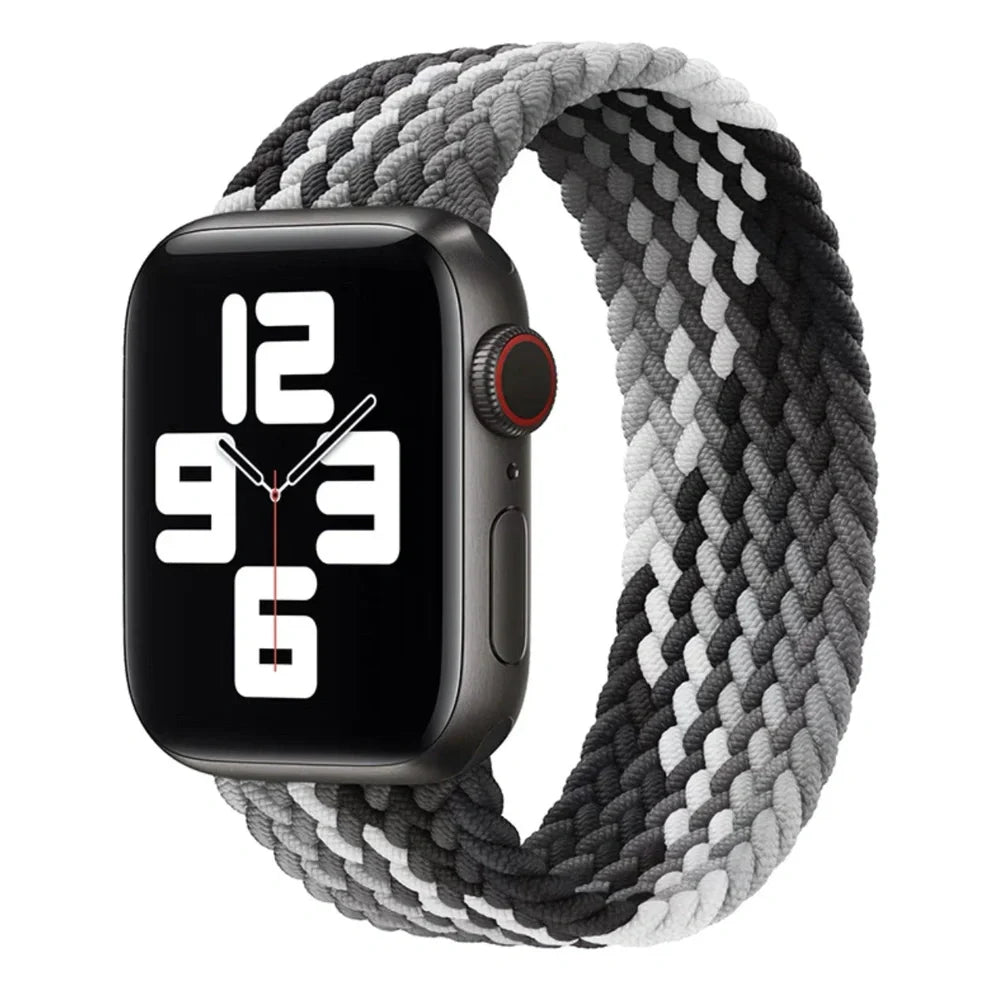 Apple Watch with elastic braided nylon strap in single-loop design showing stretch capability