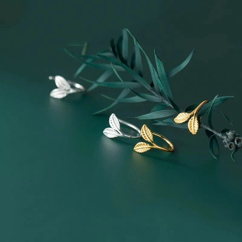 Handmade S925 sterling silver branch bud earrings in gold and white gold finishes.