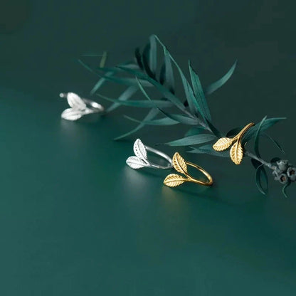 Handmade S925 sterling silver branch bud earrings in gold and white gold finishes.