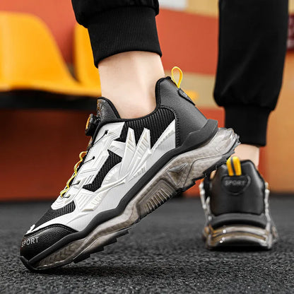 Men's black mesh dad shoes with rotating button detail and a low platform sole