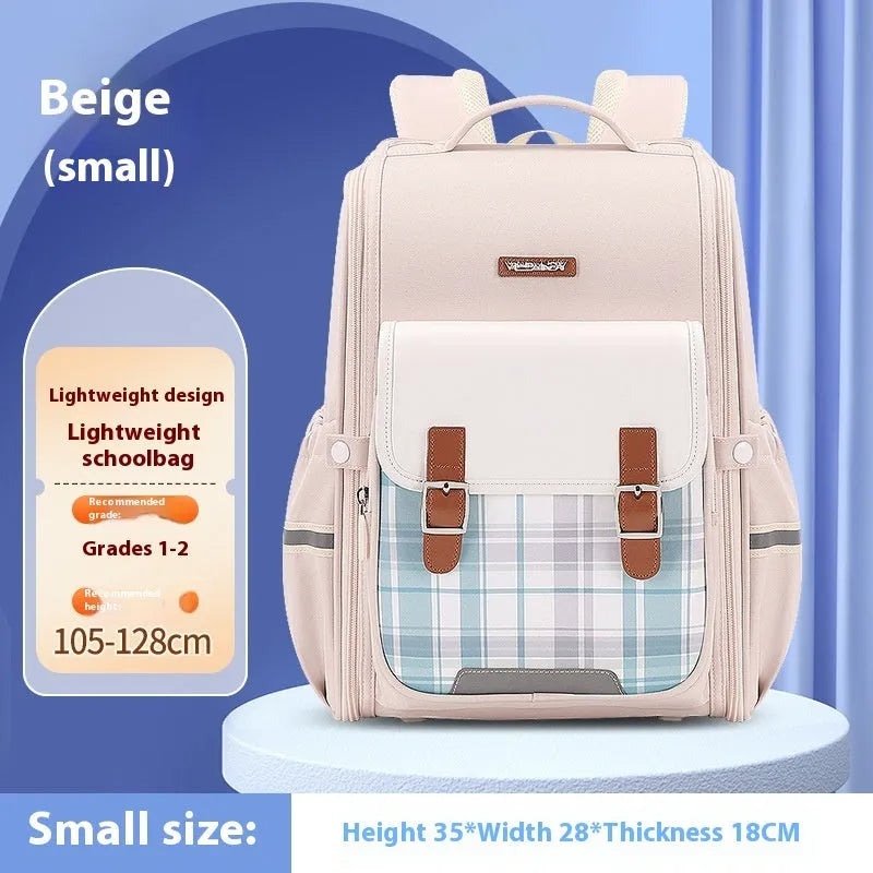 Navy blue student backpack with multiple pockets, made from durable oxford cloth for school children.