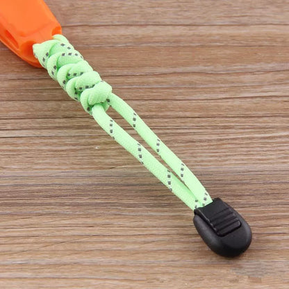 Fire Survival Whistle with dual-frequency sound emission for emergency signaling