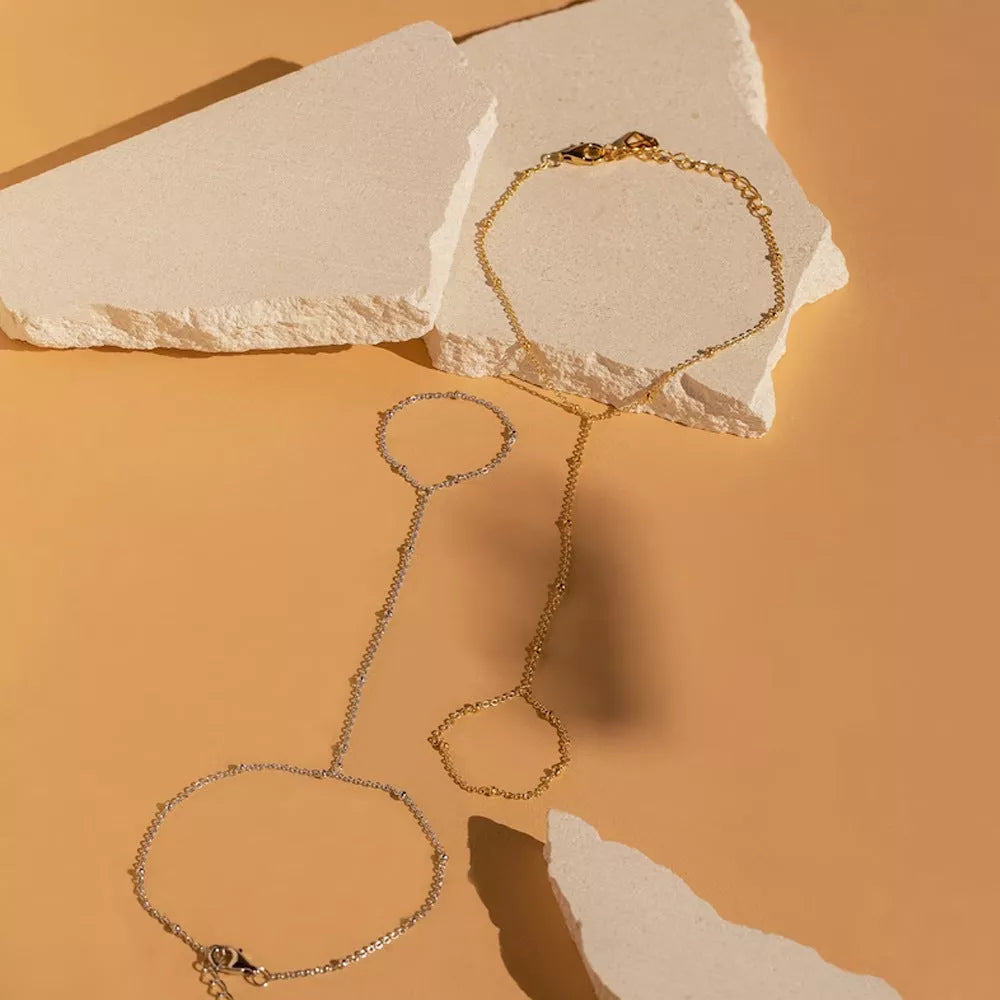 Women's stainless steel bracelet with small rice-shaped beads in gold or silver