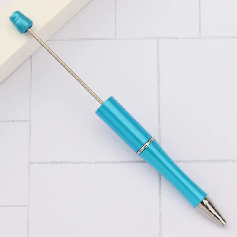Rotating bead ballpoint pen in gradient colour with ABS plastic and steel wire construction