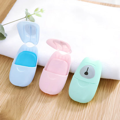 Pack of 50 pink biodegradable soap paper sheets, each 8x4.5cm, for portable hand cleaning on travels