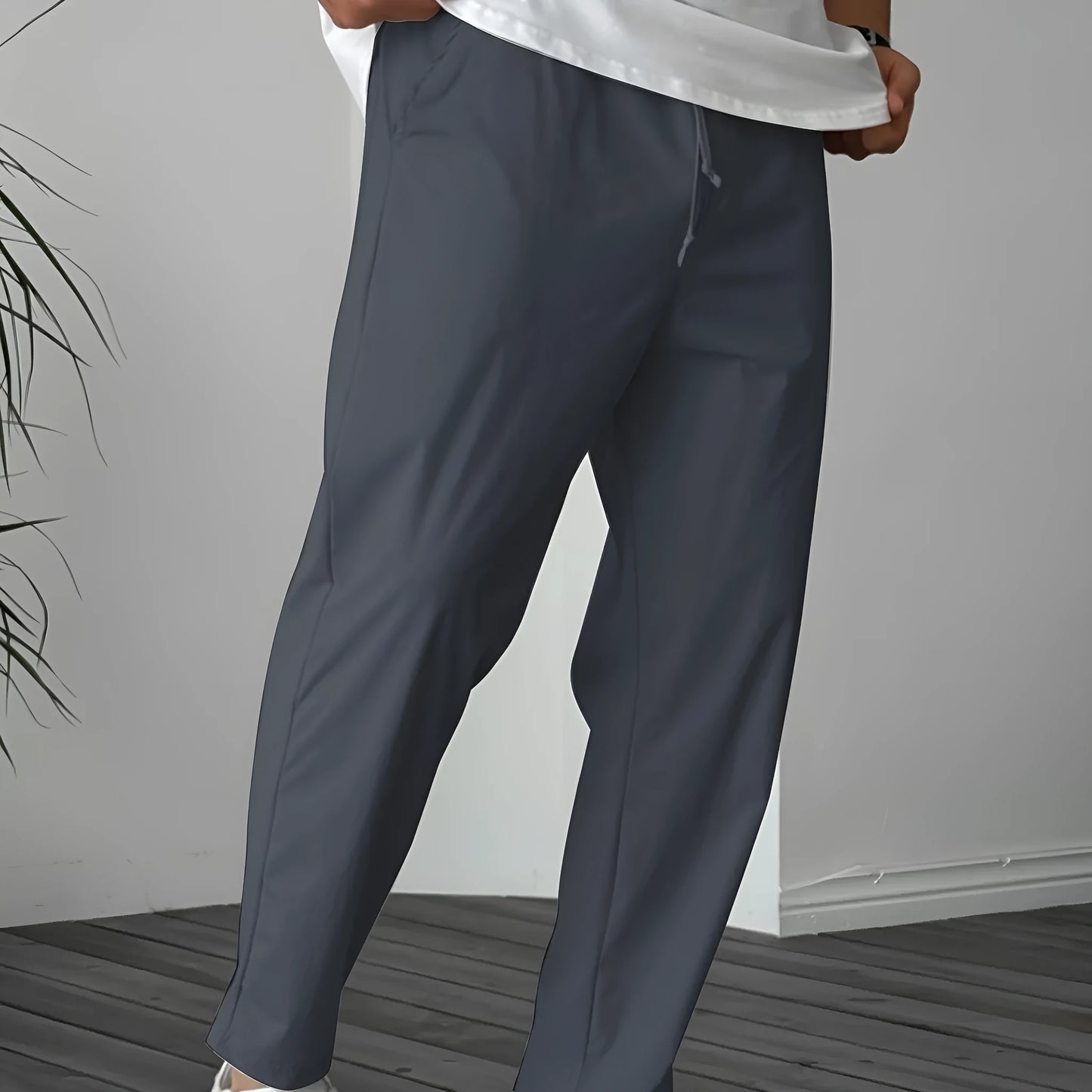 Men's khaki casual drawstring trousers with straight leg and ribbon detail on pockets