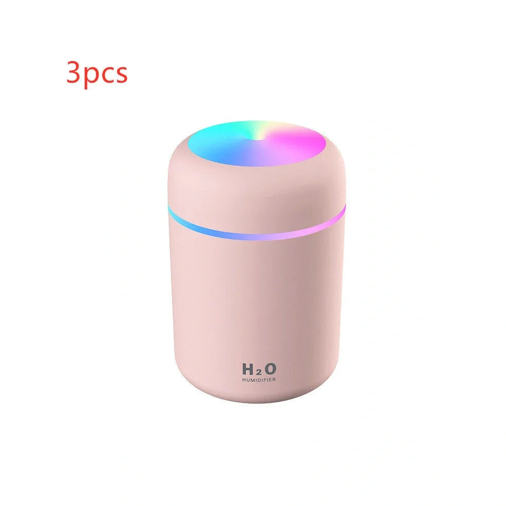 Compact USB car humidifier with colourful LED light and 300ml water tank for vehicle use