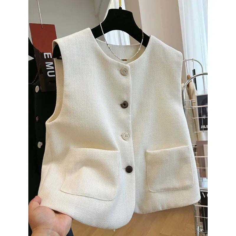 Women's round-neck sleeveless bandage vest in milky white, shown on a model.