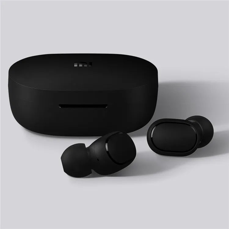 Black AirDots true wireless earbuds with charging case, showing 7.2mm drivers and three earplug sizes