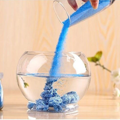Magical self-adhesive space sand in various colors, allowing for endless creative sculpting and molding even when submerged in water