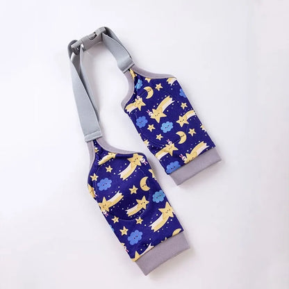 Blue dog knee protector sleeve with elbow padding and scarf on a medium-sized dog