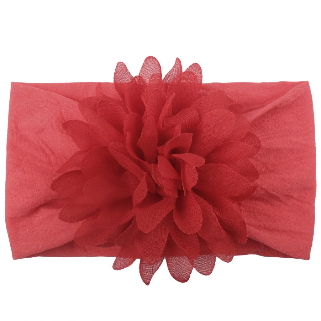 Adorable chiffon flower baby headband for your little princess, available in multiple colors.