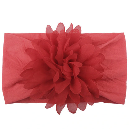 Adorable chiffon flower baby headband for your little princess, available in multiple colors.