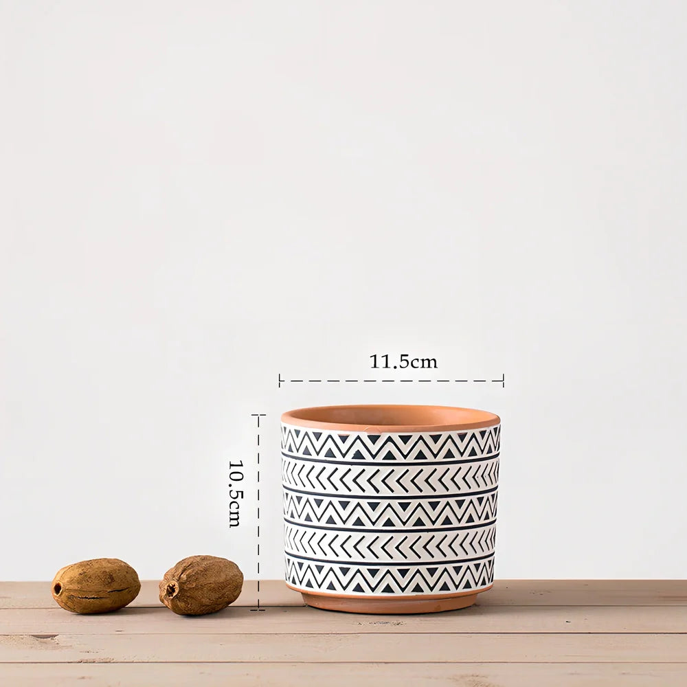 White ceramic geometric flower pot with Nordic design in three sizes for indoor plants