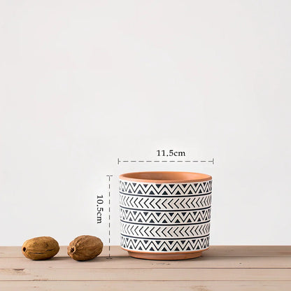 White ceramic geometric flower pot with Nordic design in three sizes for indoor plants