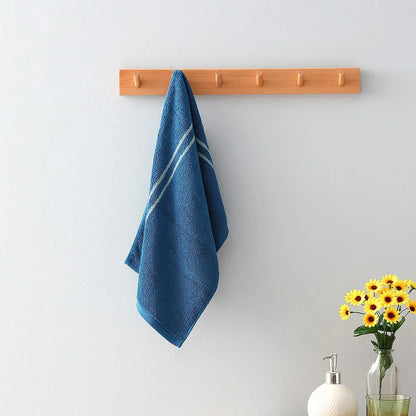 Blue smart sensor cotton towel measuring 34cm by 74cm with 100% cotton composition