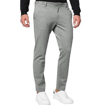 Men's slim-fit tapered chino trousers in a cotton blend fabric, shown in a solid colour.