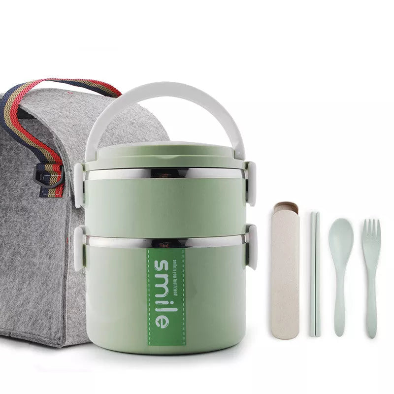 Stainless steel lunch box with built-in spoon, leak-proof design, available in green, pink, and blue