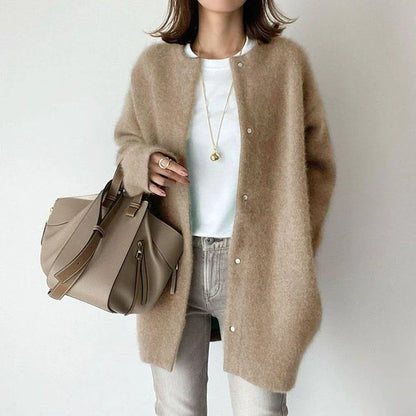 A cozy, knitted cardigan jacket in a variety of colors and sizes, featuring a relaxed open-front silhouette and premium construction for versatile layering.