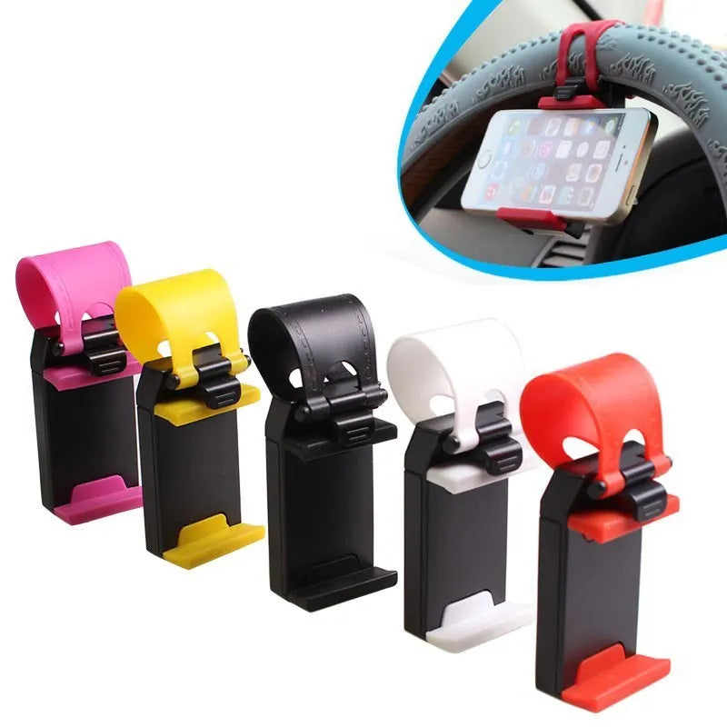 Black steering wheel phone holder with 75mm clip mounted on car wheel holding smartphone