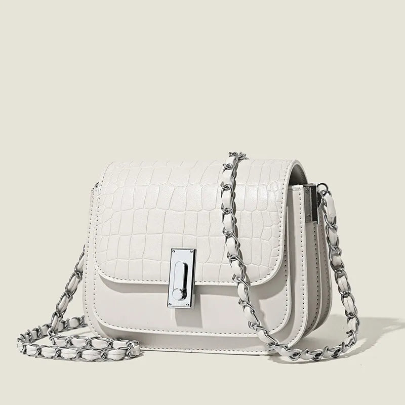 Women's soft PU shoulder bag with chain strap, horizontal square design in black colour showing sandwich pocket