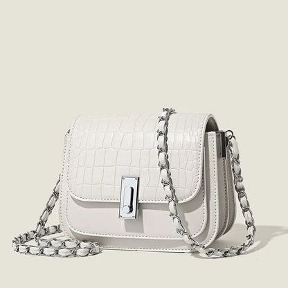 Women's soft PU shoulder bag with chain strap, horizontal square design in black colour showing sandwich pocket