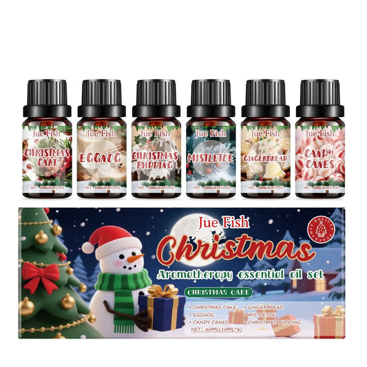 Christmas aromatherapy essential oil set with six 10ml bottles showing Christmas cake, egg wine, cane candy, gingerbread, mistletoe, and Christmas pudding scents