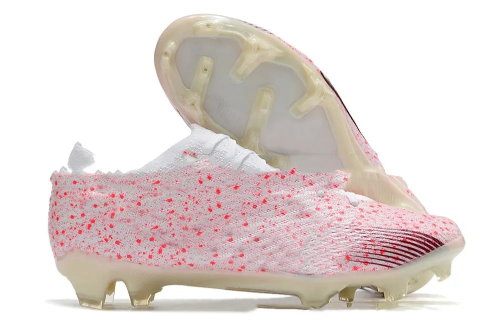Men's knitted football shoes with air cushion and FG rubber studs on natural grass