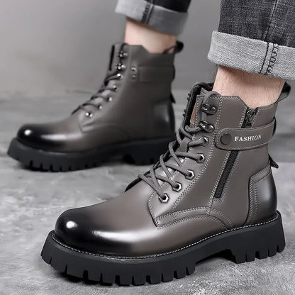 Men's light brown high-top Martin boots with side zipper and thick rubber sole on a wooden floor