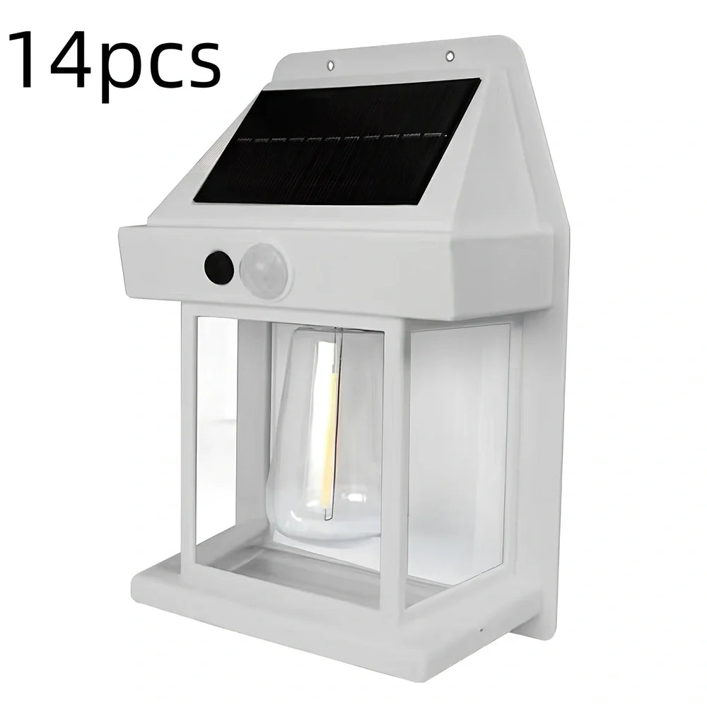 Black solar garden wall lamp with waterproof IP65 rating and automatic light sensor for outdoor installation