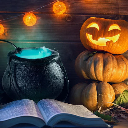 Halloween mist maker with colour-changing LEDs creating fog in water feature for indoor horror atmosphere