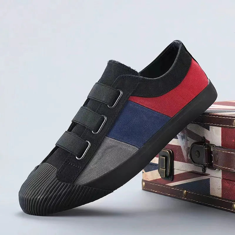 Men's canvas casual sneakers with elastic band fastening and vulcanised rubber sole in multiple colour options