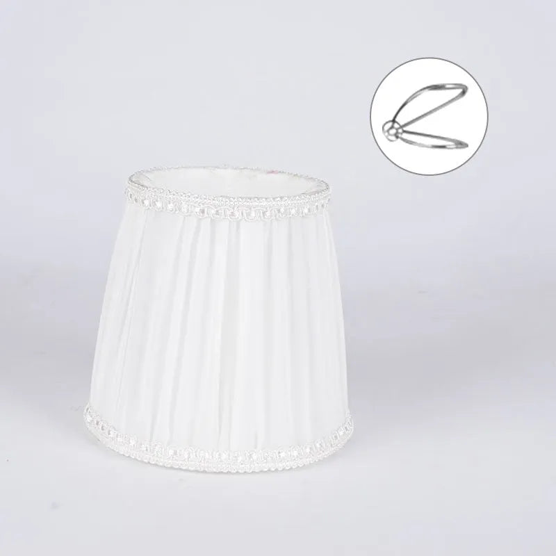 Crystal wall lamp with fabric cloth lampshade in six colour variations showing black, white and dark blue options