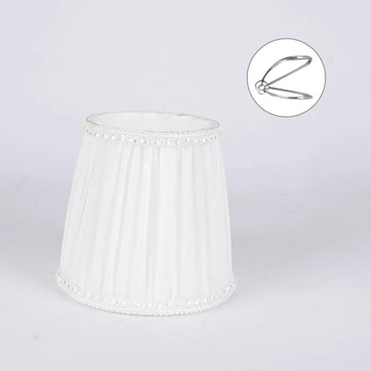 Crystal wall lamp with fabric cloth lampshade in six colour variations showing black, white and dark blue options