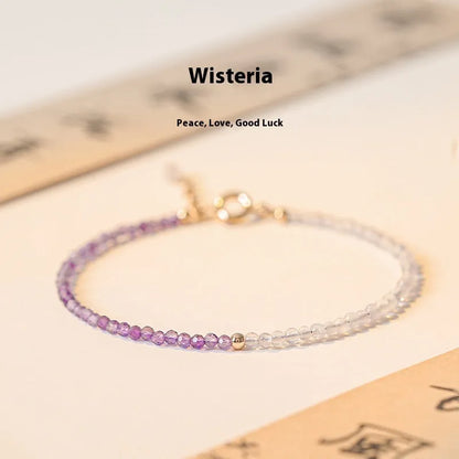 Purple geometric crystal bracelet threaded on 2mm purple rattan.