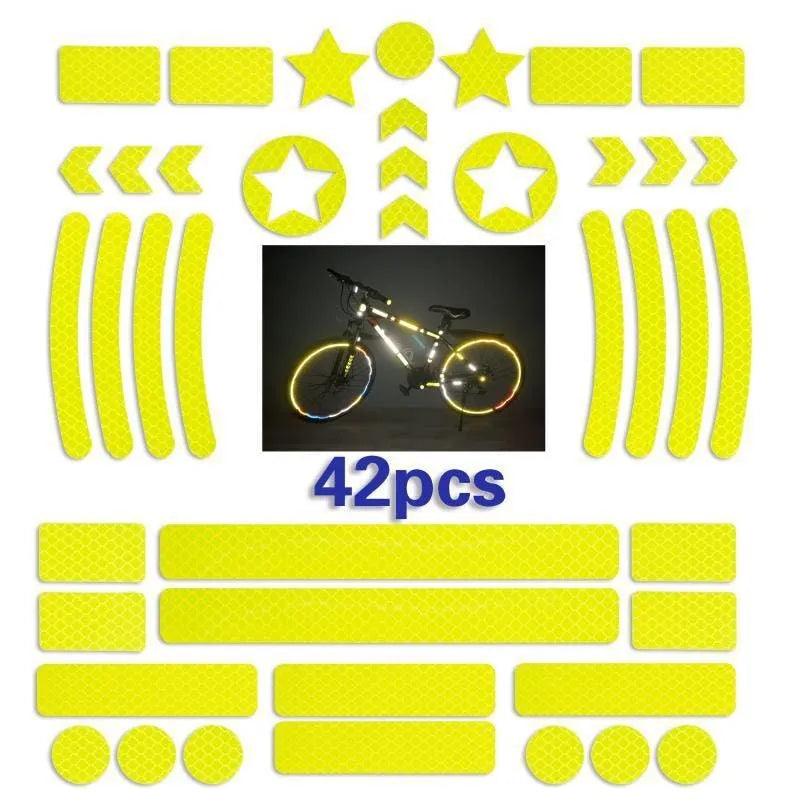 Geometric grid pattern reflective safety tape for bicycles in blue, red, white, and fluorescent yellow.