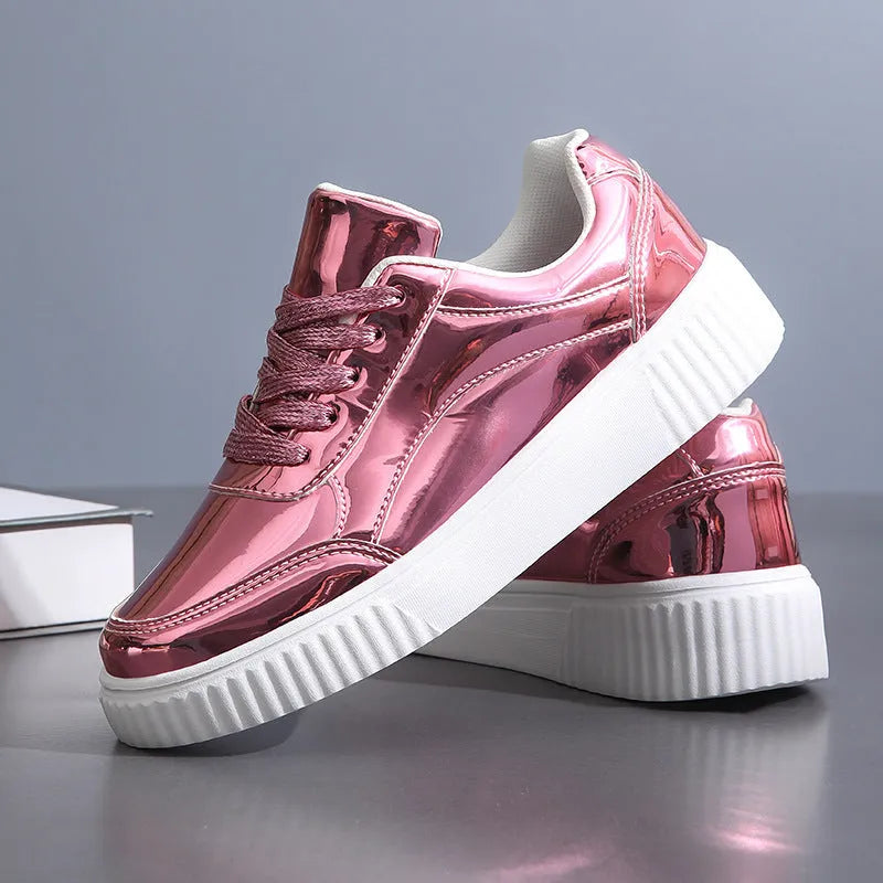 Rose gold and gold sequin platform sneakers with thick soles and round toe on a white background.