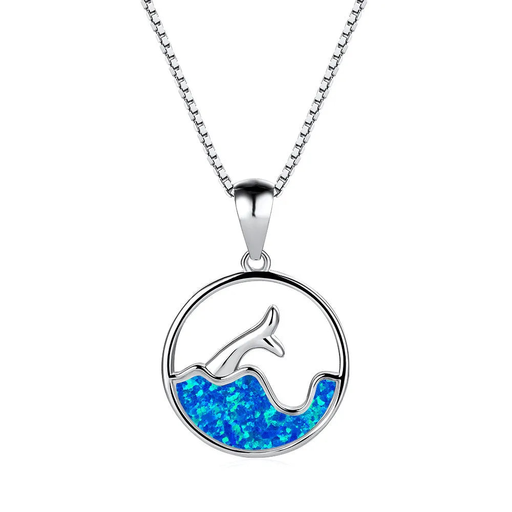 White gold electroplated copper necklace with round blue opal pendant and geometric fishtail design on adjustable chain